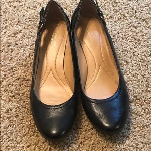 Pretty black leather wedges with buckle detail